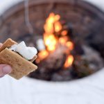 S’mores by a campfire in the winter